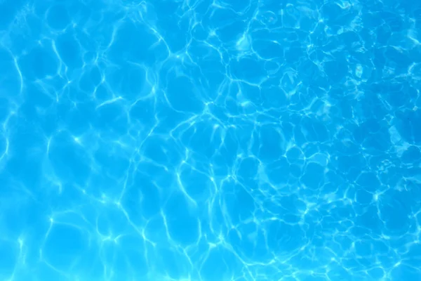 Blue color water in swimming pool rippled water detail backgroun — Stock Photo, Image