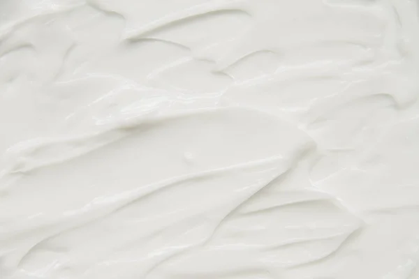 Cosméticos. Textura de fondo blanco crema. — Foto de Stock