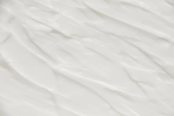 Cosmetici. Crema bianco sfondo texture. — Foto Stock