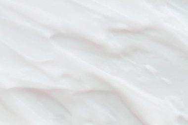 Kozmetik. Krem beyaz arkaplan dokusu.