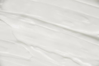 Kozmetik. Krem beyaz arkaplan dokusu.