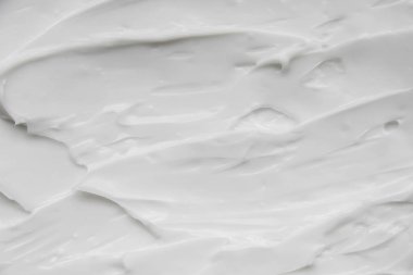 Kozmetik. Krem beyaz arkaplan dokusu.