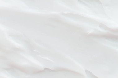 Kozmetik. Krem beyaz arkaplan dokusu.