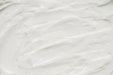 Kozmetik. Krem beyaz arkaplan dokusu.