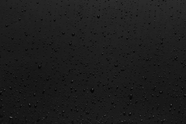 Water droplets on black background — Stock Photo, Image