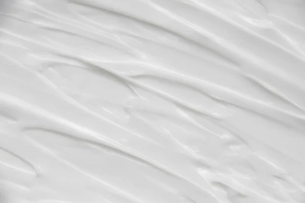 Cosmetici. Crema bianco sfondo texture. — Foto Stock