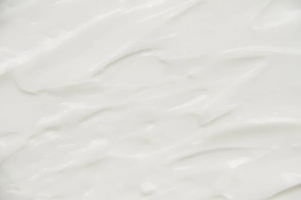 Cosméticos. Textura de fondo blanco crema. — Foto de Stock