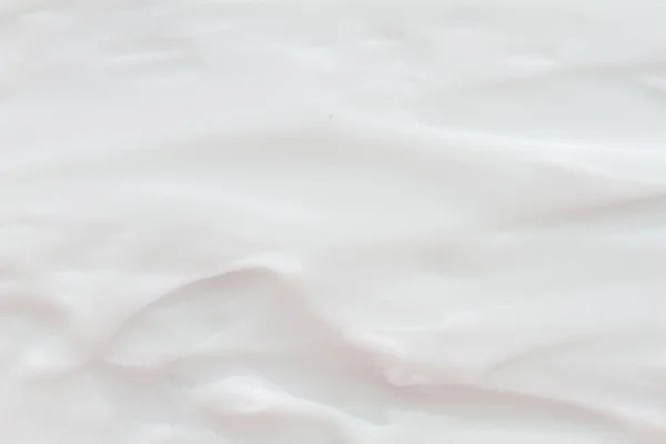 Cosméticos. Creme textura fundo branco. — Fotografia de Stock