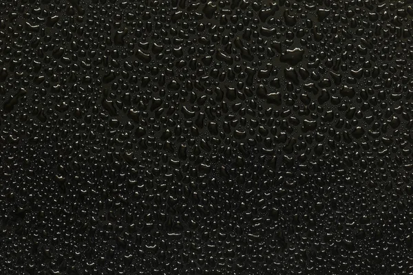 Water droplets on black background — Stock Photo, Image