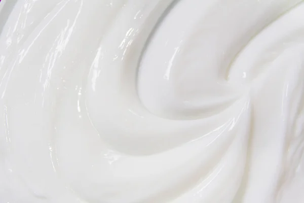 Die weiße Oberfläche der Creme Lotion weicht den Hintergrund auf. — Stockfoto
