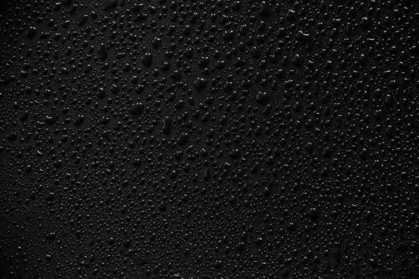 Water droplets on black background and texture. — Stock Photo, Image