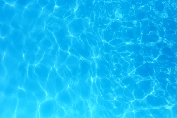 Modrá barevná voda v bazénu čeřila vodu detail backgroun — Stock fotografie