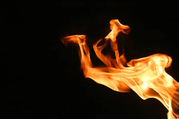 Fire flame isolated on black background — Stock Photo, Image
