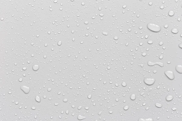 Gri arka planda su damlacıkları