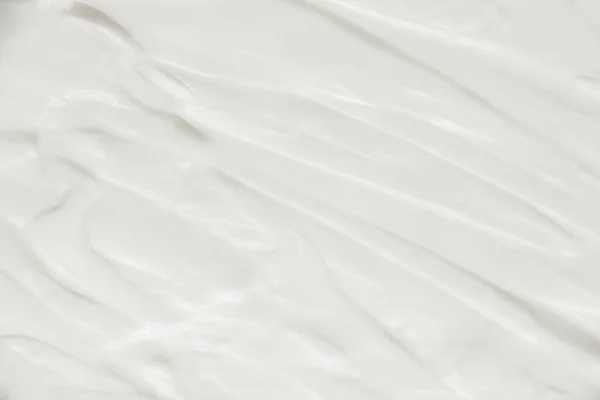 Cosméticos. Creme textura fundo branco. — Fotografia de Stock