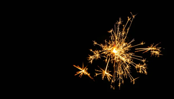 Christmas sparkler on black background. Bengal fire — Stock Photo, Image