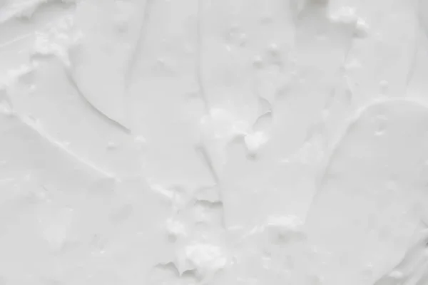 Kosmetik. Tekstur latar belakang putih krim. — Stok Foto