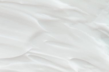 Kozmetik. Krem beyaz arkaplan dokusu.