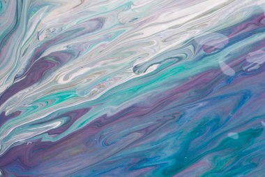 Çeşitli akan renklerin desenli arka planı 