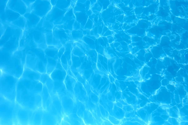 Modrá barevná voda v bazénu čeřila vodu detail backgroun — Stock fotografie