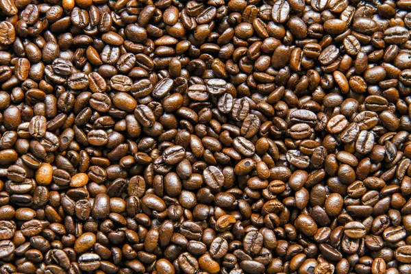 Grains de café torréfiés texture de fond . — Photo
