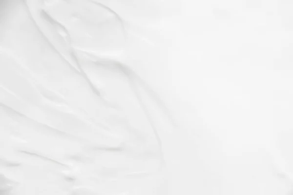 Kozmetik. Krem beyaz arkaplan dokusu.