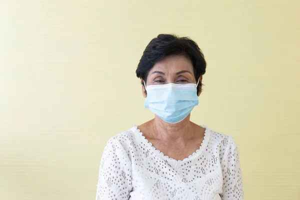 Asian women wear masks to protect against pollution and the Colona virus-19.