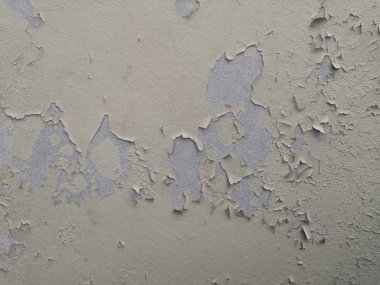 Boya bina duvarını soyuyor. Yüzey soyma boyası beyaz soyma.