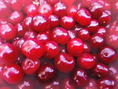 Kırmızı kiraz, makro arka plan, organik gıda malzemesi.