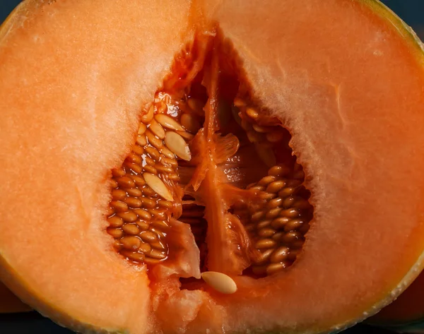 Cantaloupe sliced, macro. Melon seeds