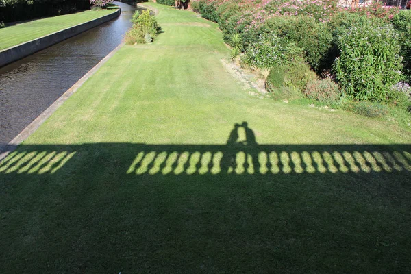 silhouettes of a couple against the landscape, France, Perpignan