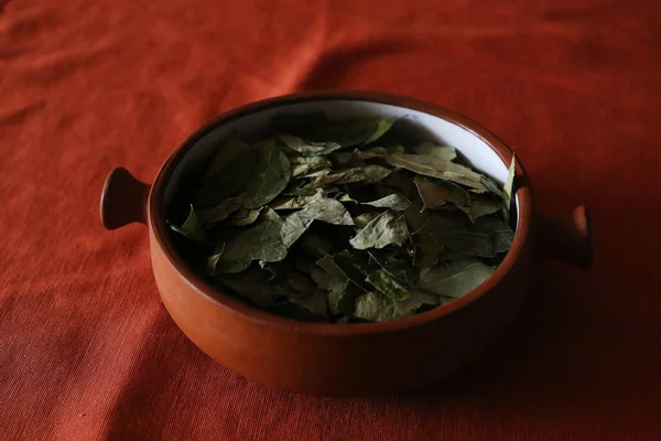 Plate of coca leaves to combat altitude sickness