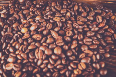 Tablo arka plan üzerinde kahve çekirdekleri