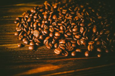 Tablo arka plan üzerinde kahve çekirdekleri
