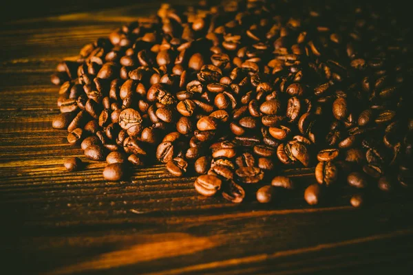 Tablo arka plan üzerinde kahve çekirdekleri
