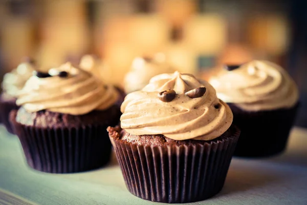 many beautiful cakes on a tray