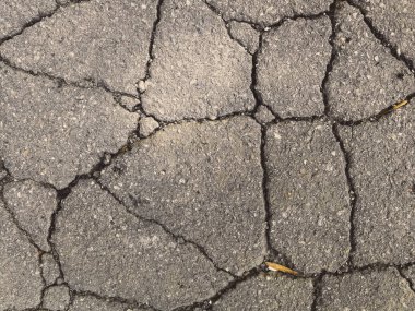 cracked asphalt texture background clipart
