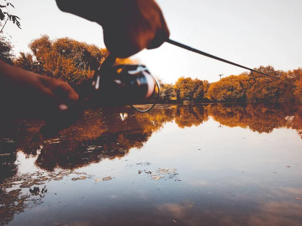 Young man fishing. bokeh , blurred background — Stock Photo, Image