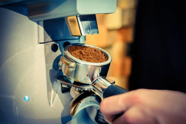 make coffee in the coffee machine