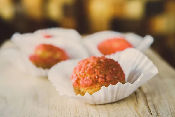 pink cookies in white packing