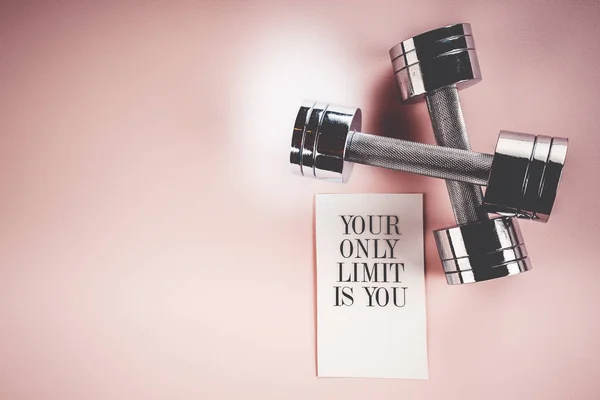 Sports concept: dumbbells on a pink background — Stock Photo, Image