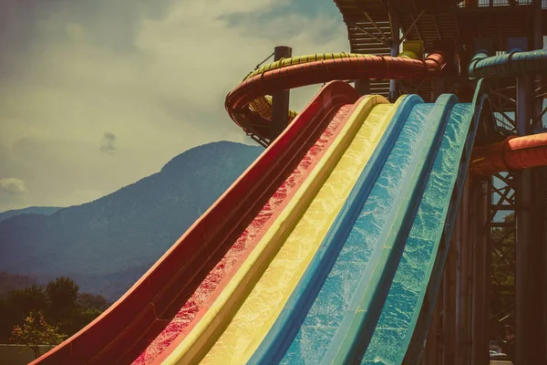 Riding water slides in the water park — Stock Photo, Image