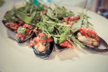 Biber ile pişmiş midye