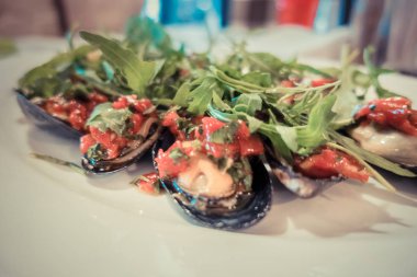 Biber ile pişmiş midye