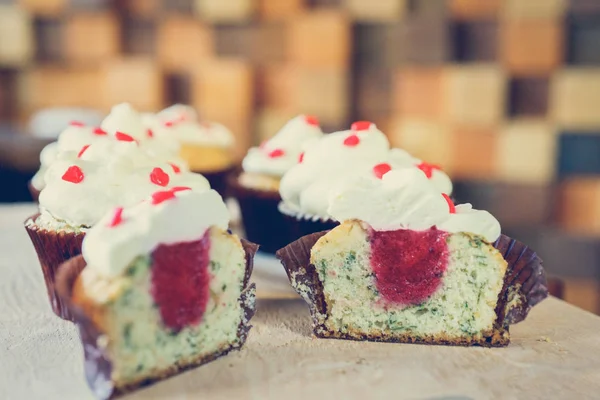 many beautiful cakes on a tray