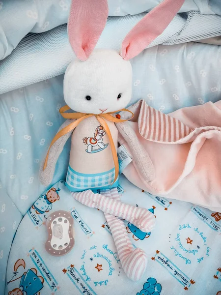 Toy bunny in a stroller — Stock Photo, Image