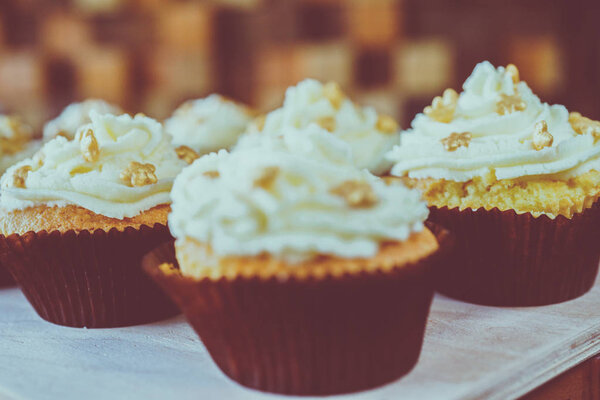 small cupcakes with cream