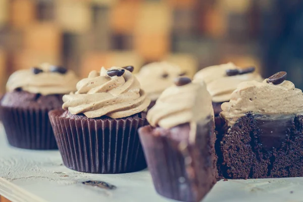 many beautiful cakes on a tray