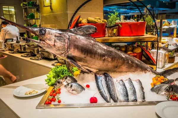 Fish sword on the table in the restaurant