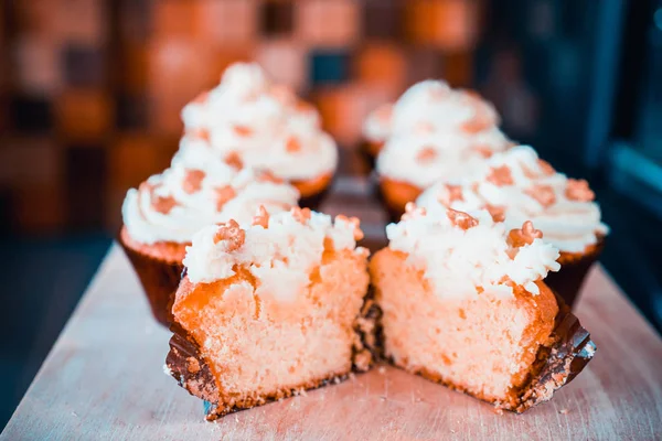 many beautiful cakes on a tray